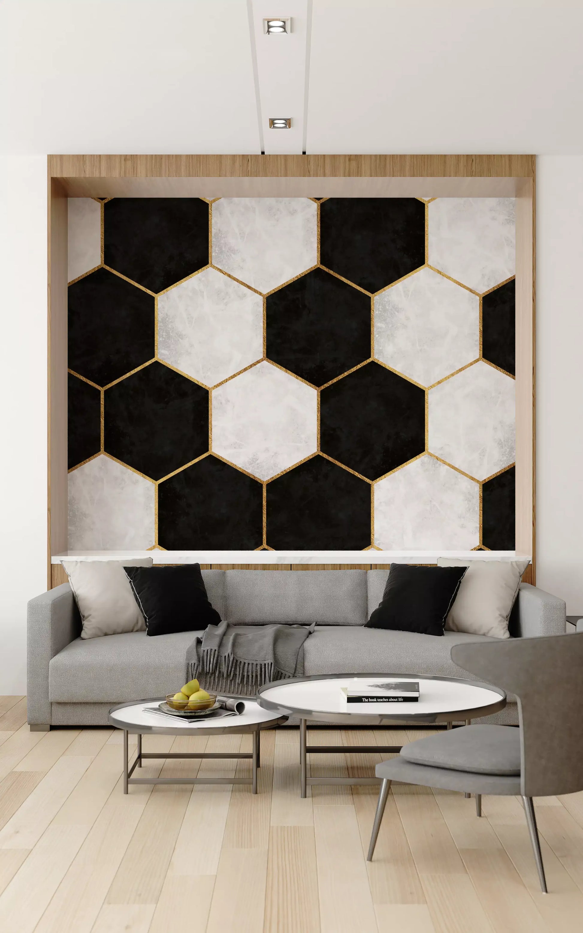 Black and gold honeycomb wall mural anchoring a refined Living room setting
