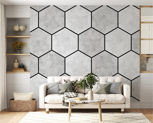 Soft marble hexagon wall mural set behind a relaxed living room space