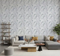 Fragmented gray shapes pepper the living room with Grayscale Mosaic wallpaper.