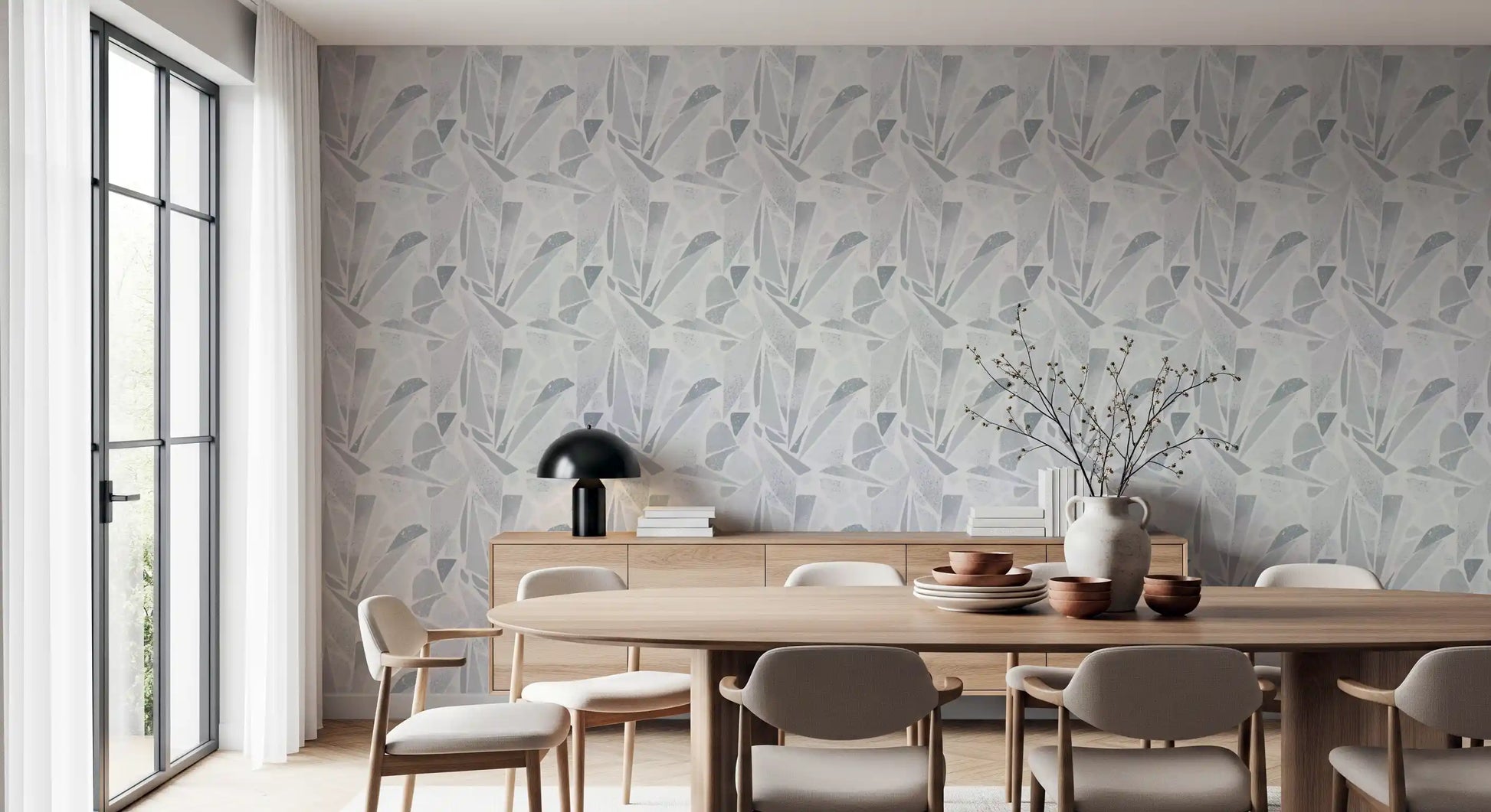 Geometric shards calm the Dining room in Fragmented Grayscale Mosaic wallpaper.