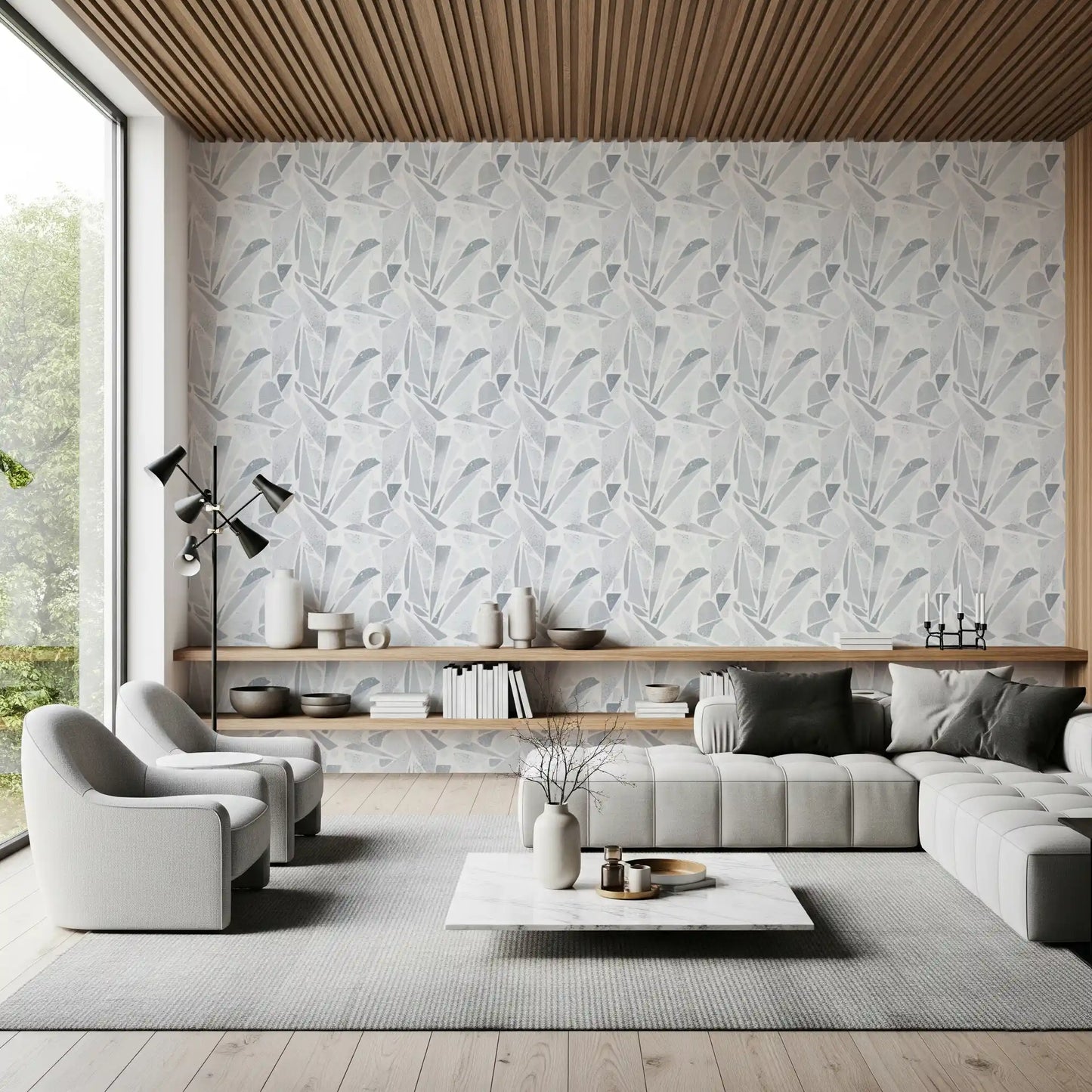 Grayscale fragments break across the living room in this Mosaic wallpaper.