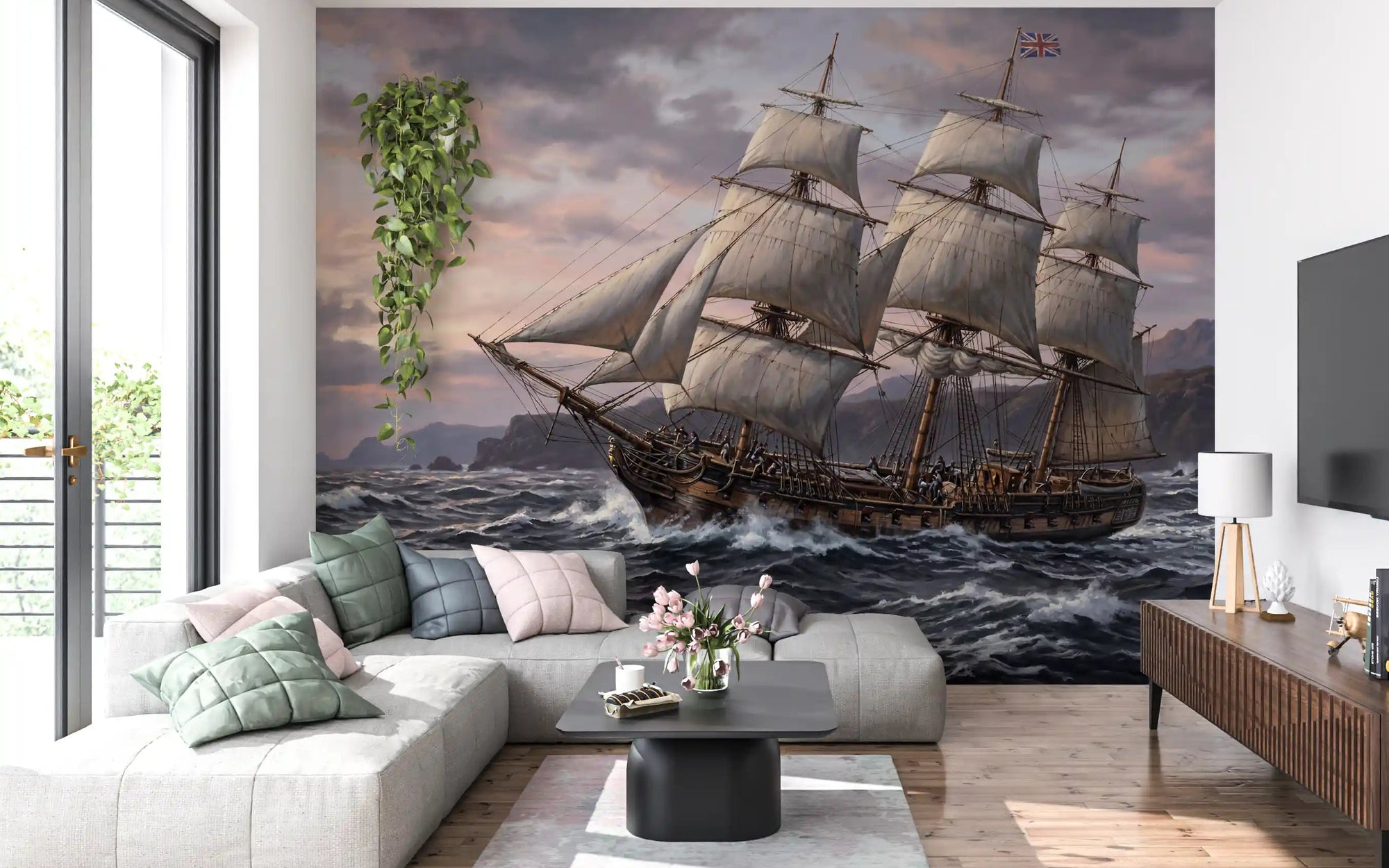 Sailing ship wall mural anchors a calm living room with coastal tones.