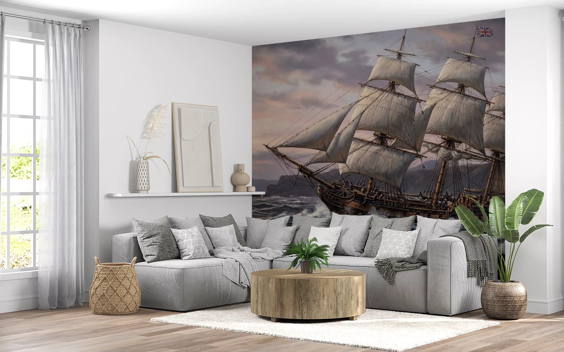 Living room backed by a Grand Sail wall mural in muted brown and rose hues.