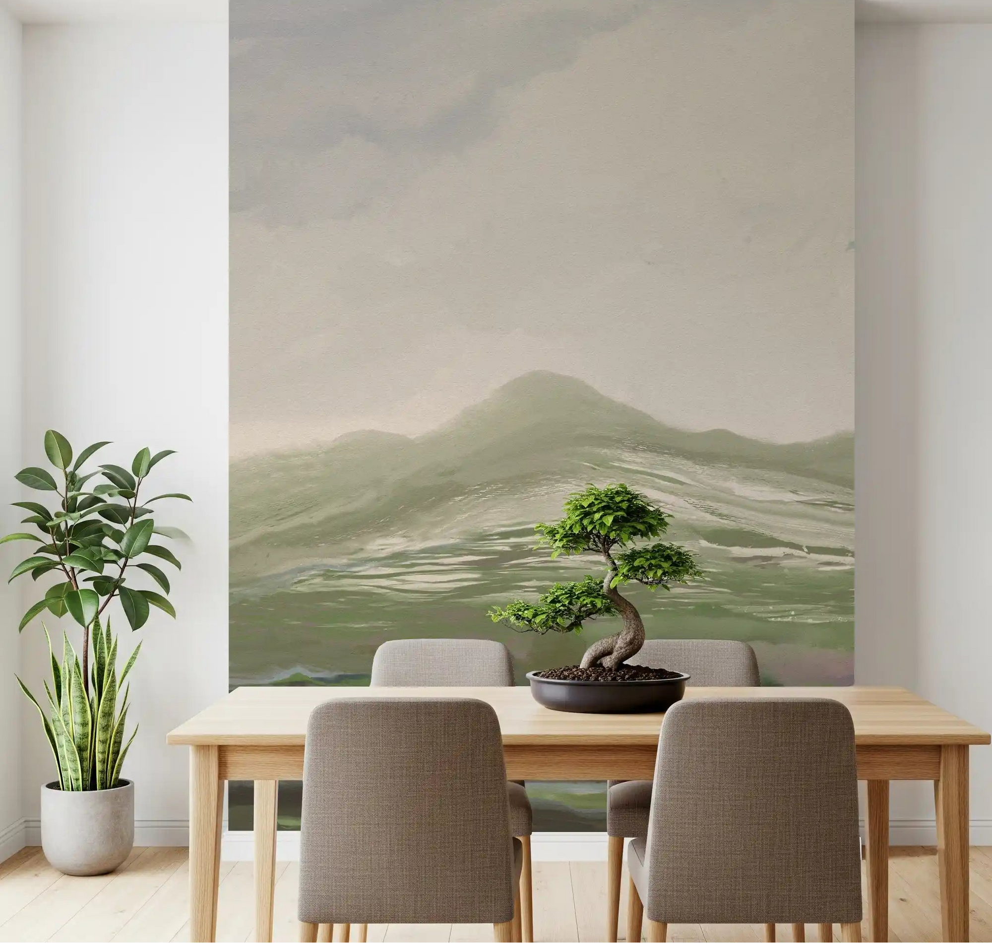 Pastoral landscape wall mural styled in a calm dining room with soft sage green tones