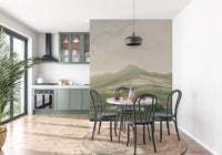 Dining room styled around the painterly pastoral landscape wall mural in green