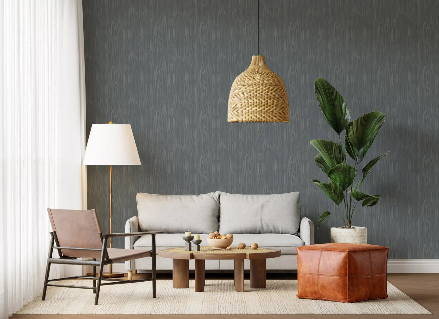 Cool greige tones from the moody strokes wallpaper define this calm, quiet Living room 