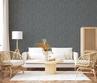 Neutral living room sits in front of the painterly greige wallpaper backdrop