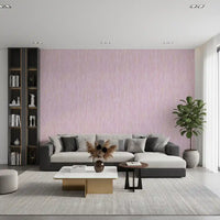 Open lounge styled with the Ethereal Blush Strokes pink wallpaper across the back 