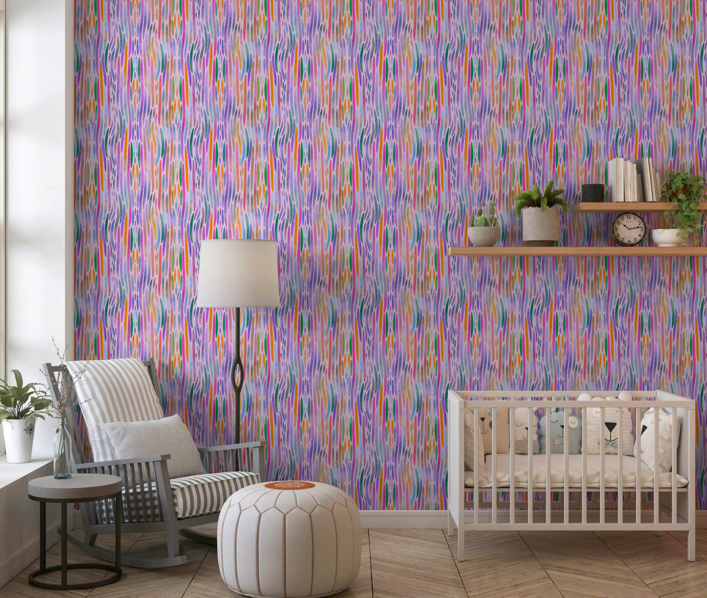 Lively painterly ribbons of orange, green and blue stream across the chromatic flow wallpaper