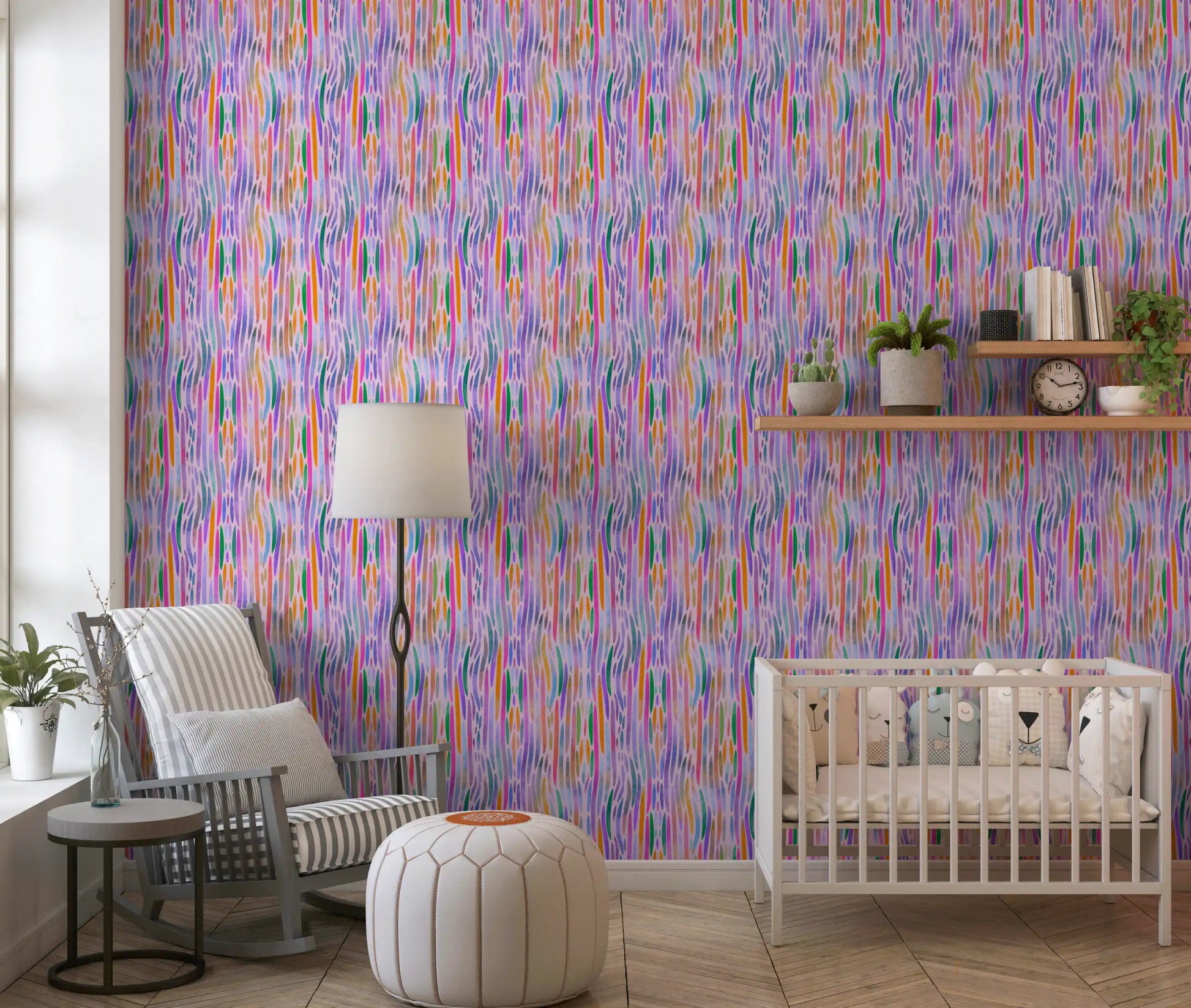 Lively painterly ribbons of orange, green and blue stream across the chromatic flow wallpaper