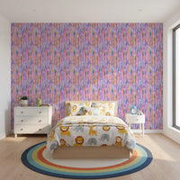 Vertical watercolour stripes shape the rainbow pattern wallpaper in bright multicolour tones