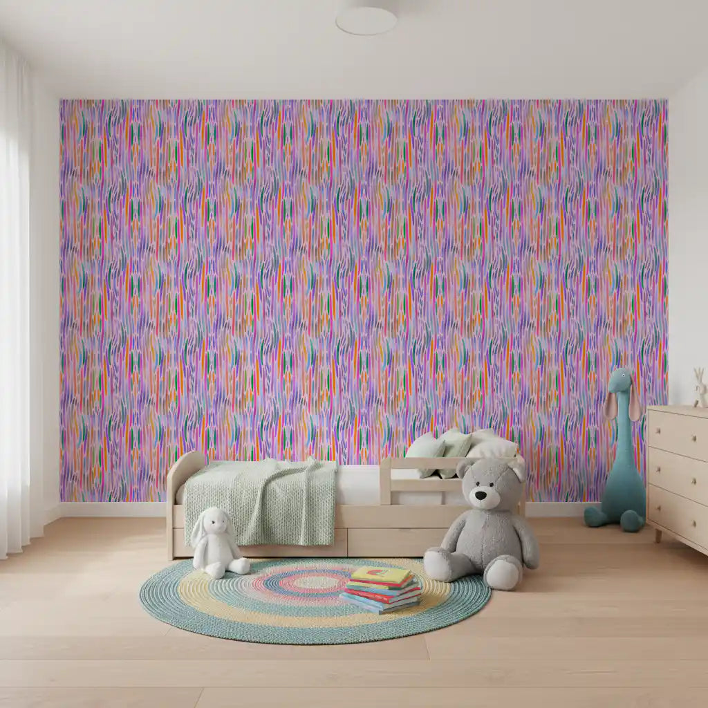 Playful nursery showing the rainbow brushstroke pattern wallpaper across a bright 