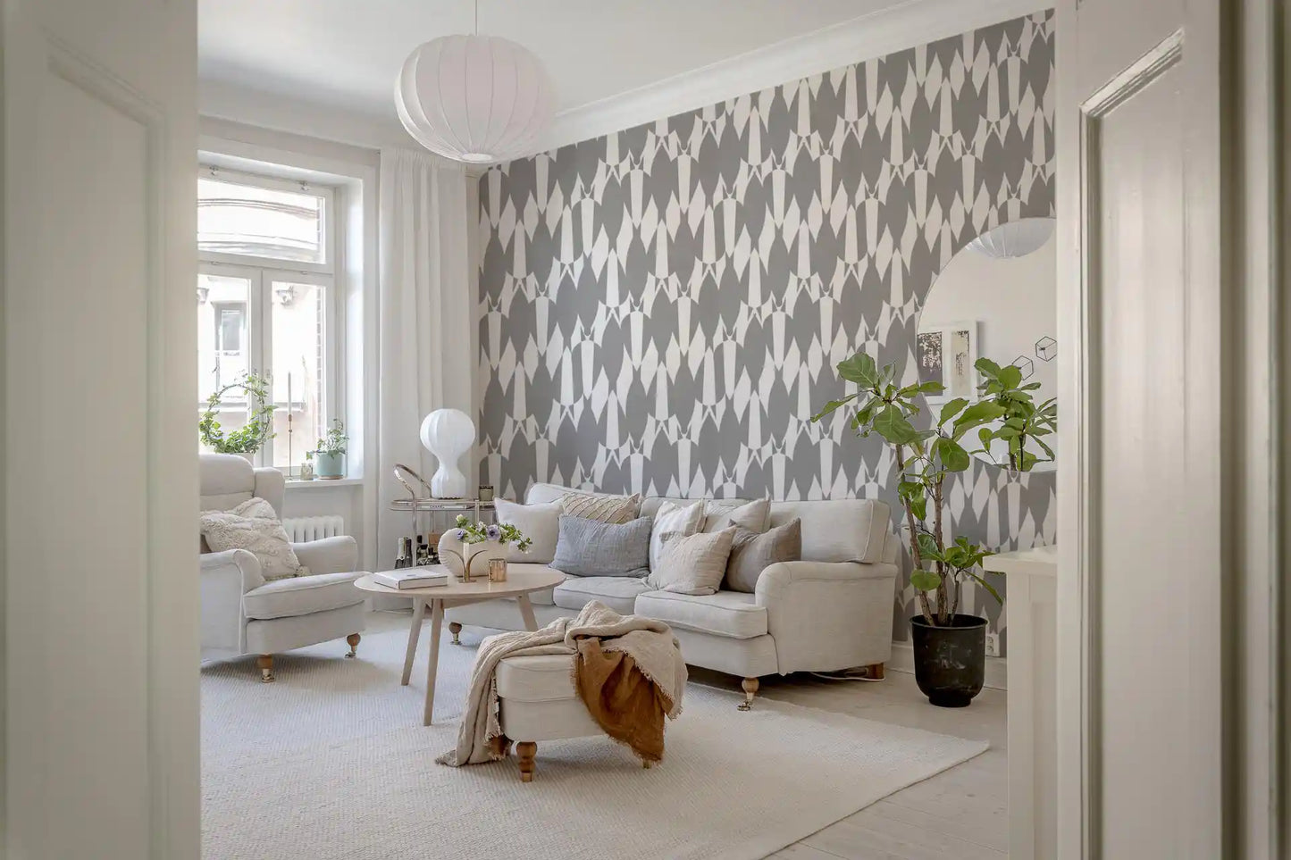 Geometric flow wallpaper featuring elongated teardrop motifs in two tones