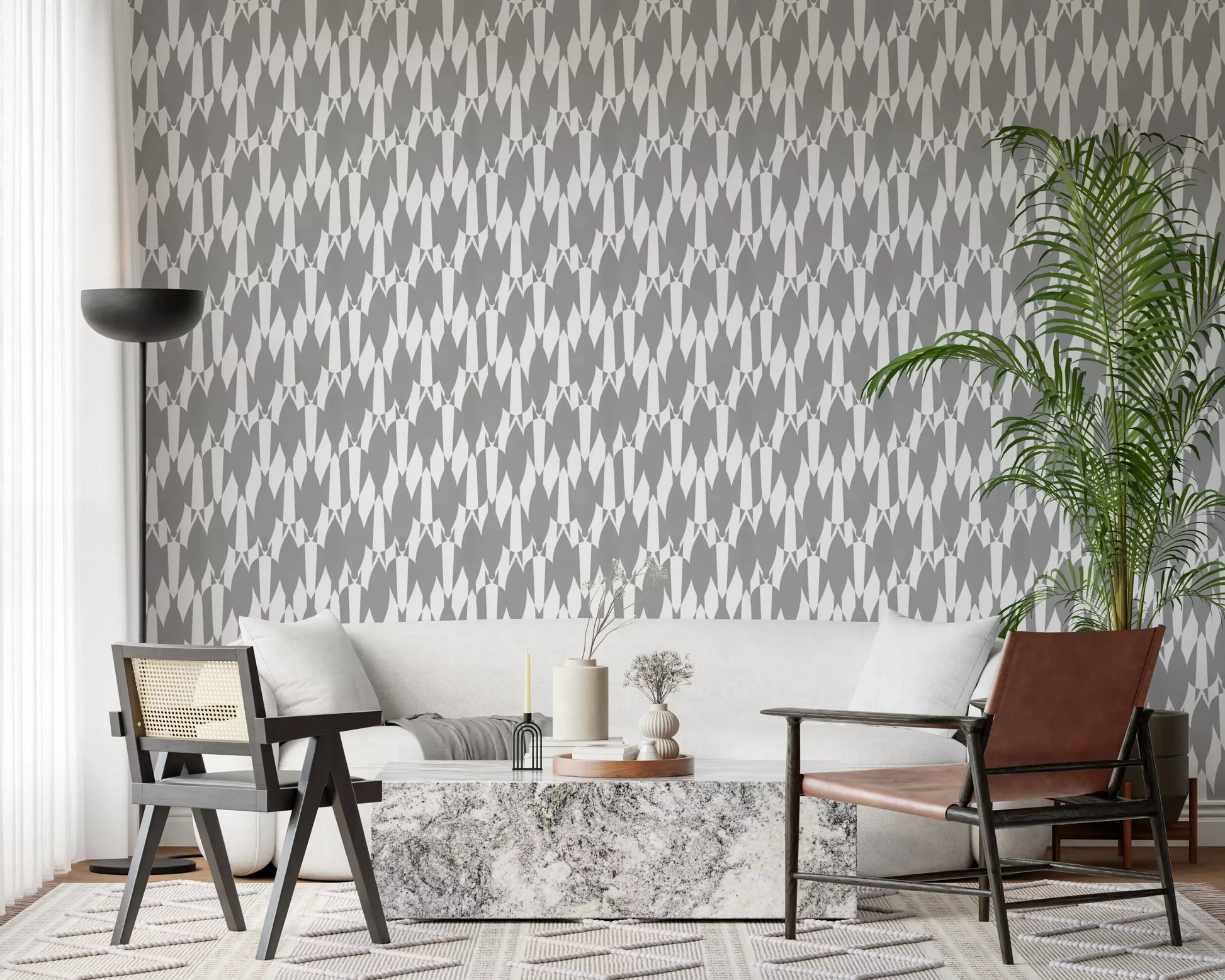 Modern lounge finished in white teardrop motif wallpaper on gray