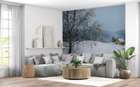 Yellow house winter wall mural filling a Living room in pale blue and white