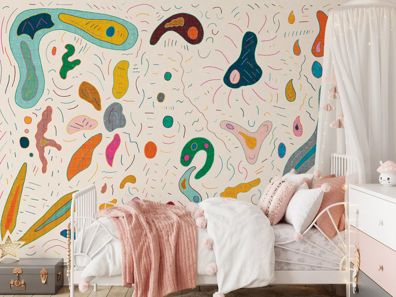 Abstract shapes wall mural in multicolor covering a kids' bedroom
