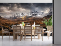 Snow-peak mountain wall mural spread across a Dining room in cinematic earthy tones