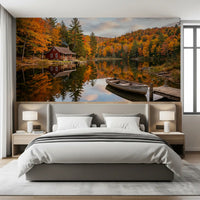 Autumn foliage reflection wall mural across a master bedroom in deep orange and red