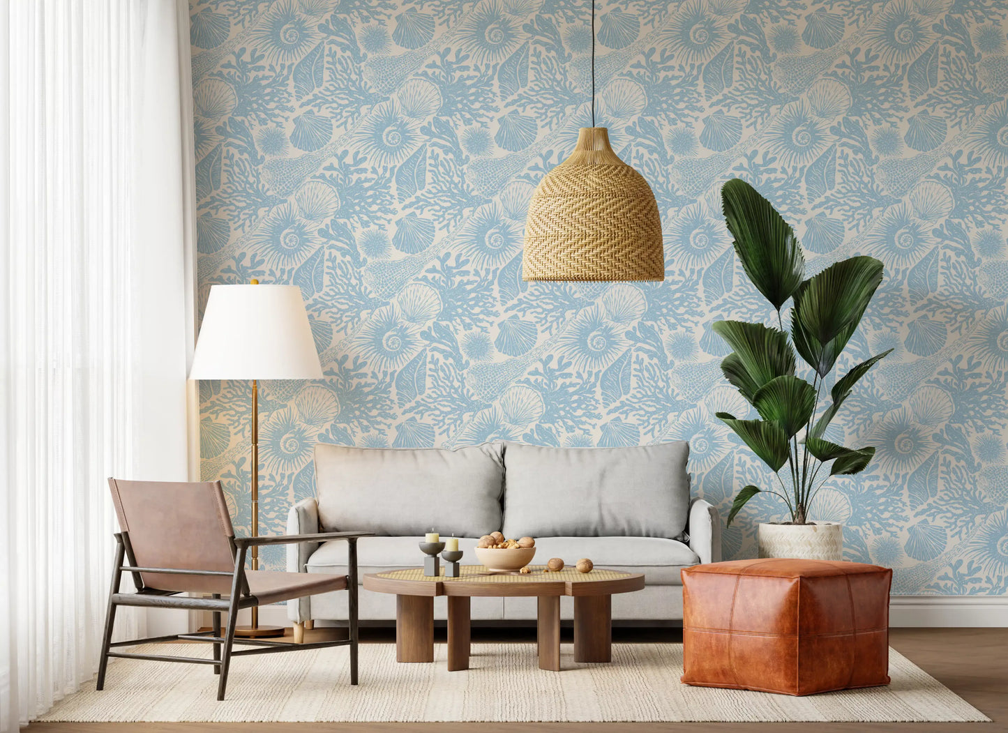 Coastal seashell wallpaper living room  area  in soft blue and cream tones