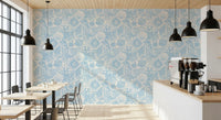 Seashell coral wallpaper in a Café in powder blue on a cream ground