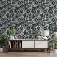 Coral and Seashell wallpaper across a hallway backdrops in midnight navy and cream