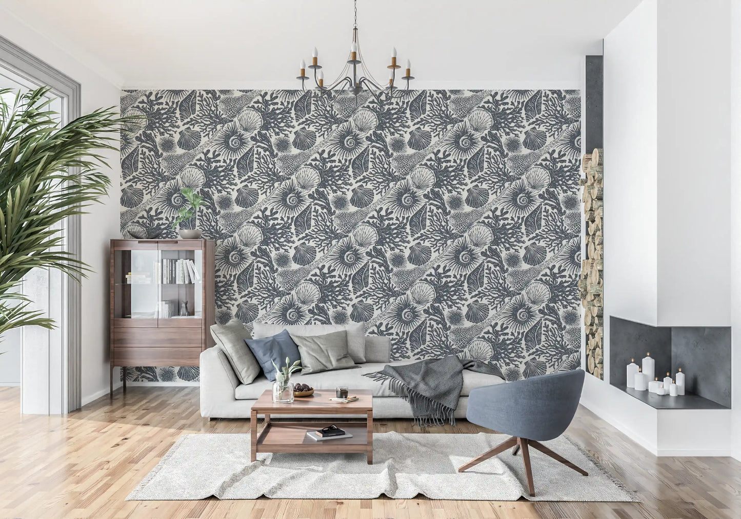 Navy seashell wallpaper along a living room feature surface in cream and blue