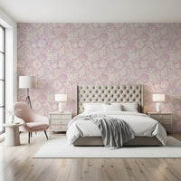 Seashell Coral lavender wallpaper covering a bedroom in warm purple-pink tones
