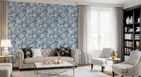 High-contrast white motifs floating on the vivid blue boho seashell wallpaper