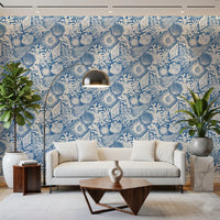Living room featuring the bold denim blue boho seashell wallpaper pattern