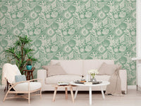 Sunlit living room feature with boho seashell and coral aqua green wallpaper