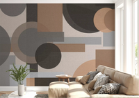 Living room wallpaper feature with Earthy Geometric Harmony abstract wall mural behind bed