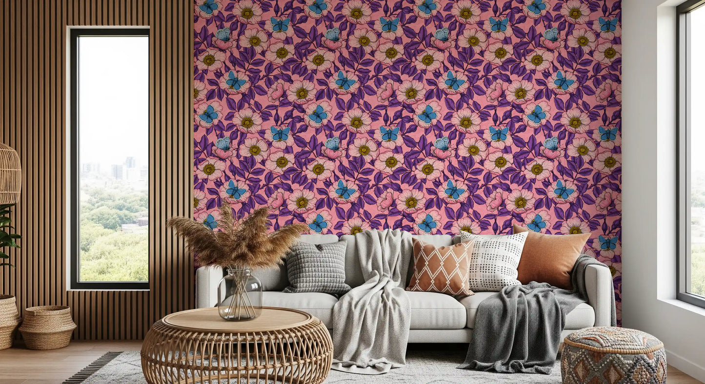 Twisting purple foliage winds between blue butterflies and roses in this floral wallpaper