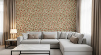 Cream backdrop sets off curling green vines on Warm Folk Floral wallpaper