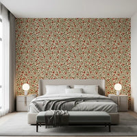 Warm Folk Floral Vines wallpaper showing coral blooms and dark green leaves