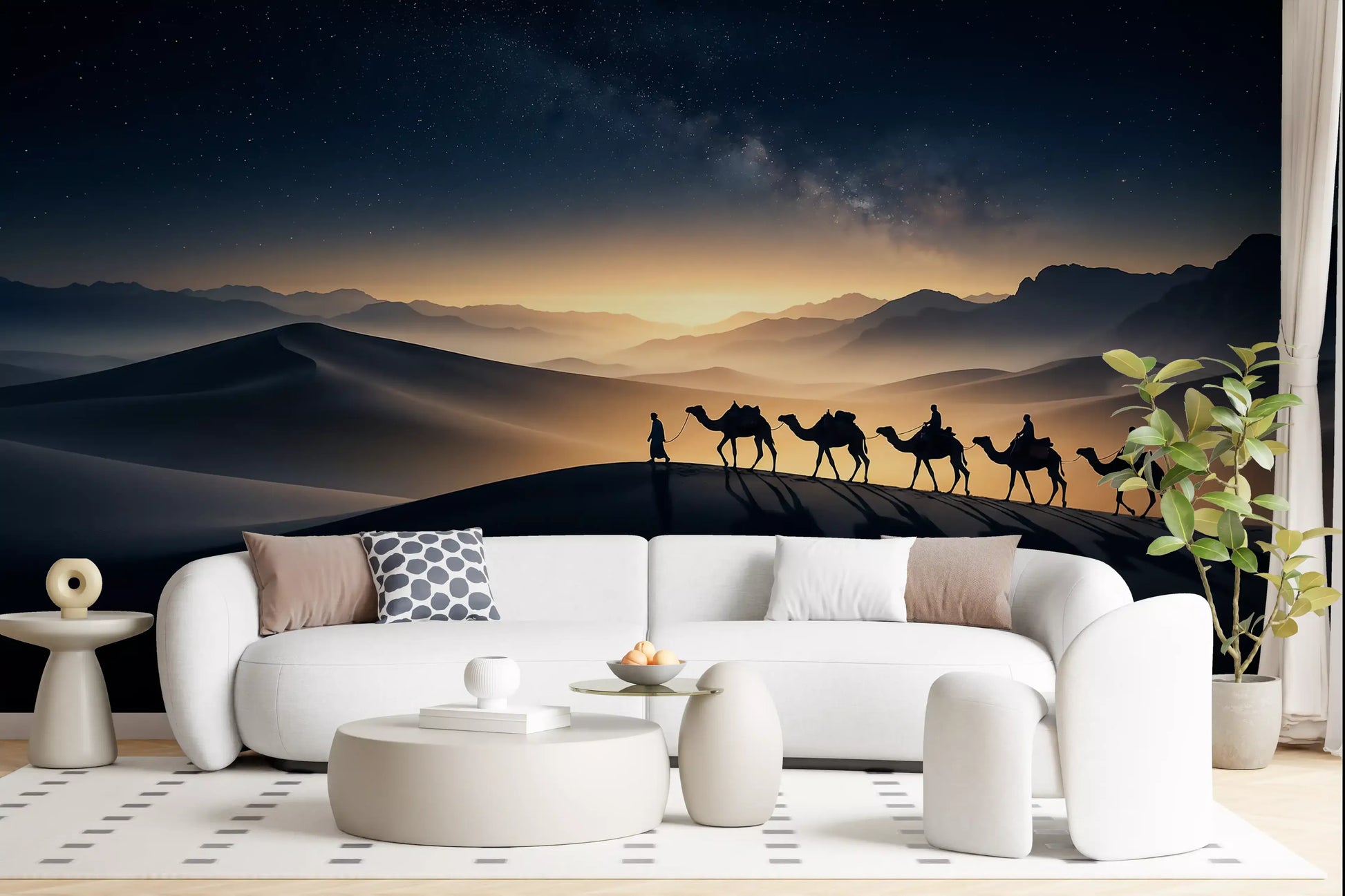 Camel caravan silhouettes walk a sand ridge under the Milky Way in this desert wall mural