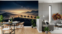 A faint golden horizon lifts the rider silhouettes across the desert trek wall mural