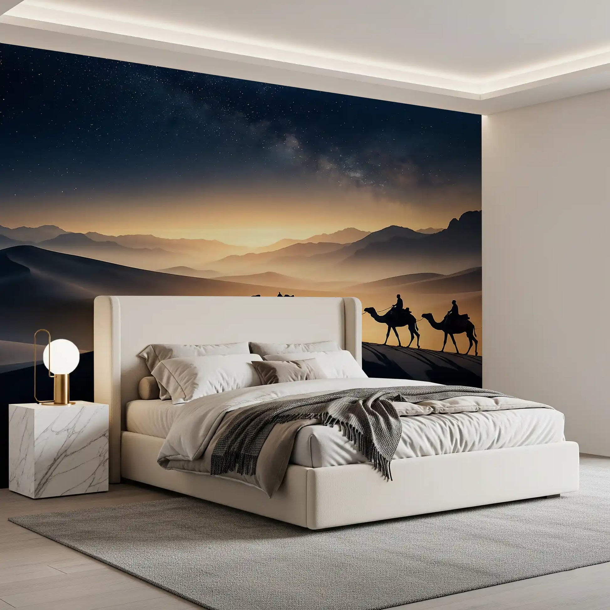 Behind the caravan, distant mountain layers fade into haze in this Milky Way wall mural