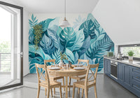 Painted monstera leaves and fern fronds fill the Botanical Oasis wall mural