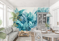 Tropical leaves and aqua ferns refresh a dining room with Botanical Oasis wall mural
