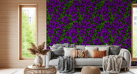 At the centre of every bloom, pale starry detail anchors the purple clematis vine wallpaper