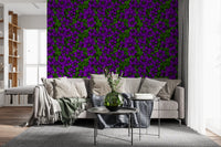 Purple clematis vine wallpaper grounds the open lounge in deep botanical hues
