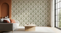 Olive daisy florals nest inside cream scallop arches in this Tuscany wallpaper.