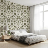 Tiny grey dots sit between scallops in the Tuscany Olive wallpaper for added rhythm.