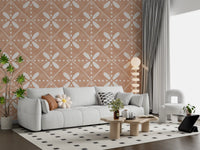 Tuscany Bloom Cotto Tile wallpaper repeats painted petal motifs over a warm peach base.