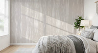 Bedroom area enhanced by a subtle streaks wall mural.