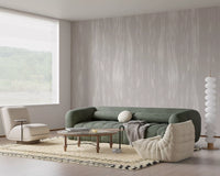 Soft white flowing patterns across a delicate beige wall mural.
