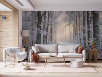 Winter forest wall mural providing a calm backdrop for a lounge.