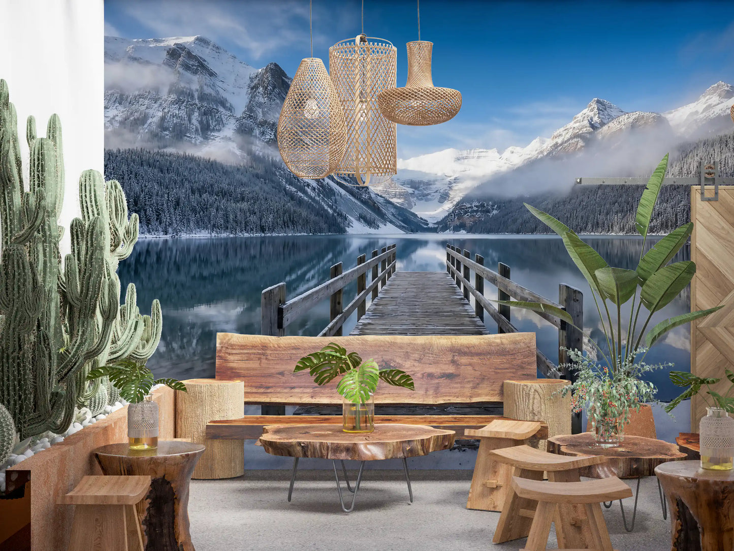 Wooden café and restaurant siting area by a winter mountain wall mural.