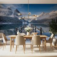 Frosty evergreen trees bordering a pristine lake wall mural scenery.