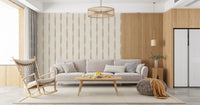 Nude Pink Textured Distressed Stripes on Cream Wallpaper styling a cozy living room.
